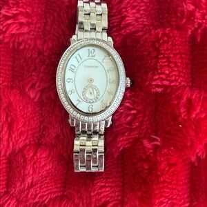 Tourneau Silver Watch with Diamonds.